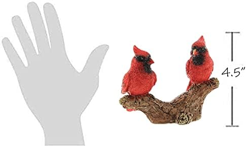 Kardinali smješteni na figurici grane drveća